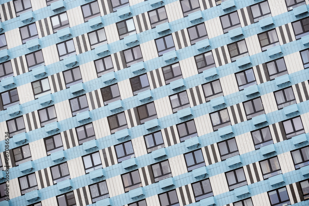 Bright facade of residential building abstract window background 