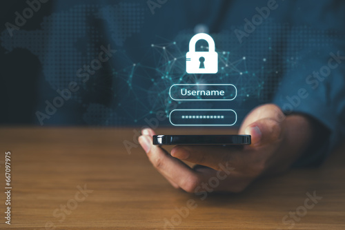 Business man using mobile phone with padlock and key icon screen, Data Security system concept, innovation technology, cloud computing, internet network communication