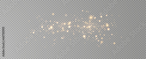 Golden sequins glow with many lights. Glittering dust. Luxurious background of golden particles.	