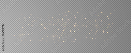 Golden sequins glow with many lights. Glittering dust. Luxurious background of golden particles.	