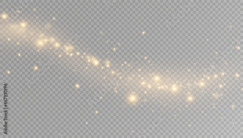 Golden sequins glow with many lights. Glittering dust. Luxurious background of golden particles.	