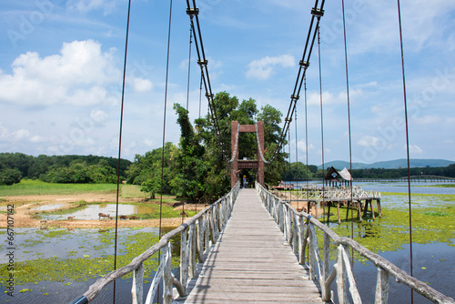 Chom Kwang Bridge and Ecotourism attraction in Nong Yai Royal Development Initiative Projects and Regulating Reservoir for thai people travelers travel visit on October 11, 2023 in Chumphon, Thailand