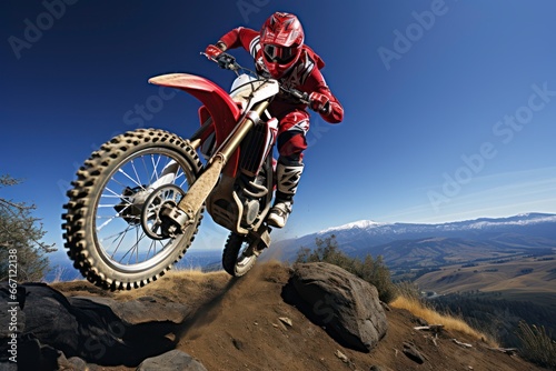 Motocross Athlete Performing Stunt Represents the Thrill of Extreme Sports and Pushing Boundaries © khairulz