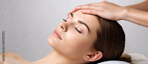 Craniosacral therapy eases pain and migraines through head massage photo