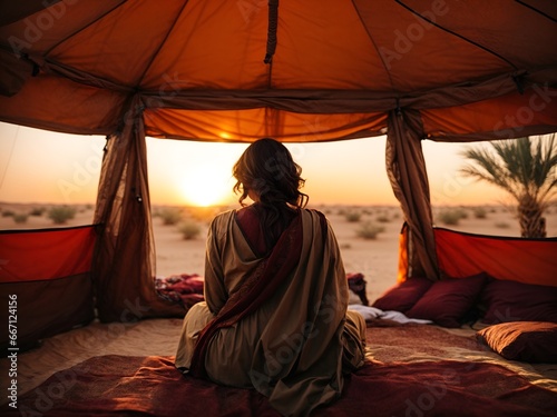 An arab woman sitting in a tent