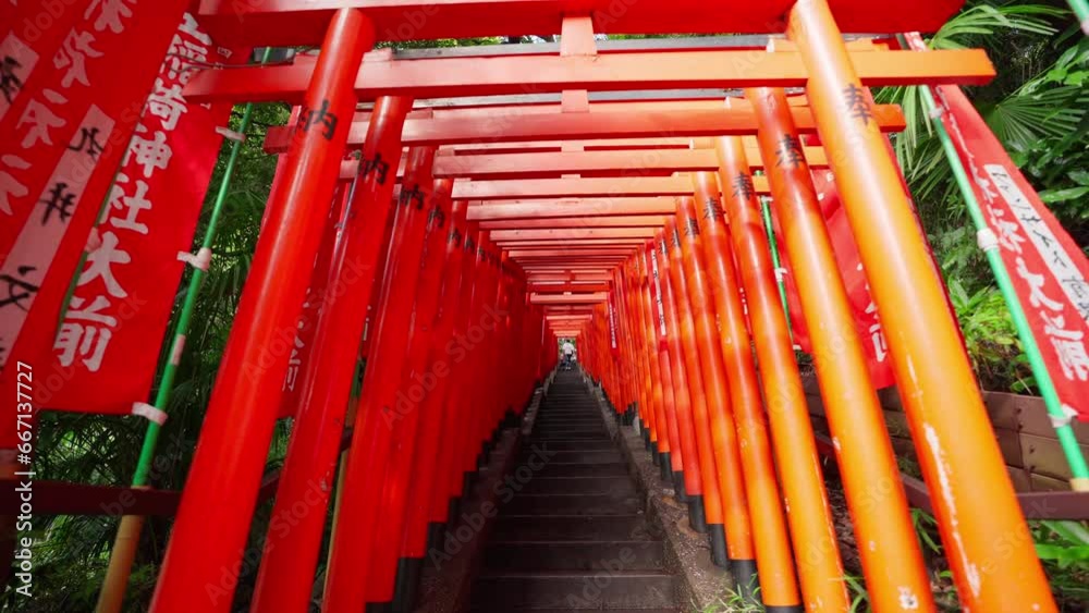 Tokyo, Japan, October 10, 2023 : Red flags banners called nobori and Row of Gates Torii path in Hie Shinto shrine in Minato, Tokto, Japan. Hie shrine gate entrance Tokyo, Japan, October 10, 2023 : Red flags banners called nobori and Row of Gates Torii path in Hie Shinto shrine in Minato, Tokto, Japan. Hie shrine gate entrance