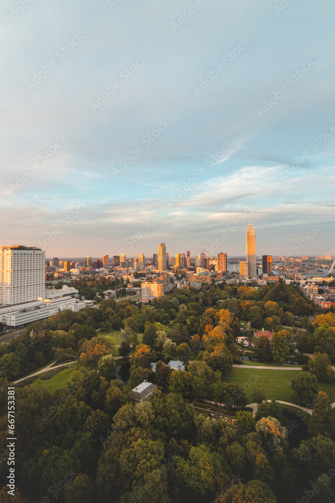 Fototapeta premium Sunset over Rotterdam city centre and its surrounding park. Sunset in one of the most modern cities in the Netherlands