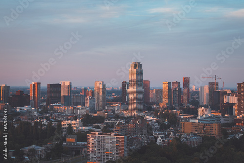 Sunset over Rotterdam city centre and its surrounding park. Sunset in one of the most modern cities in the Netherlands