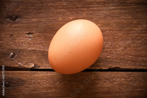 Egg on a rustic wooden board