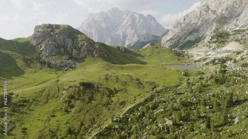 4k drone forward video (Ultra High Definition) from flying drone top of Falzarego pass of Limides lake. Majestic autumn scene of Dolomite Alps, Italy, Europe. Beauty of nature concept background. 4k drone forward video (Ultra High Definition) from flying drone top of Falzarego pass of Limides lake. Majestic autumn scene of Dolomite Alps, Italy, Europe. Beauty of nature concept background.