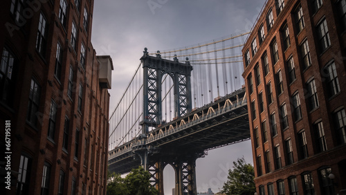 Photograph of the Manhattan Bridge from the Dumbo district in New York at sunset.