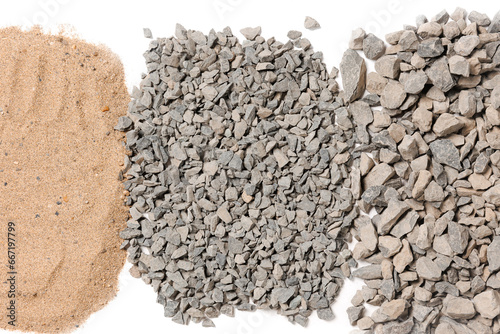 Raw construction materials, pile of sand and gravel or crushed stone for on white isolated background
