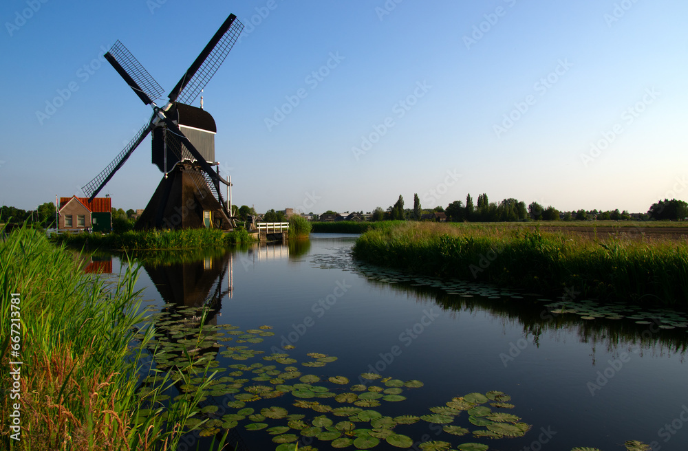 Traditional Dutch windmill on a sunny summer day