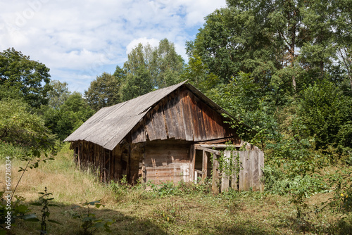 Old wooden barn. Rural courtyard  © Roman