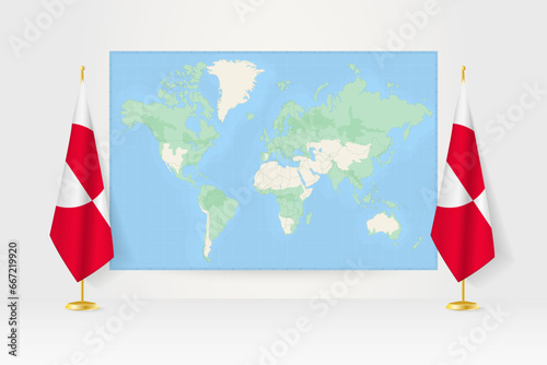 World Map between two hanging flags of Greenland flag stand.