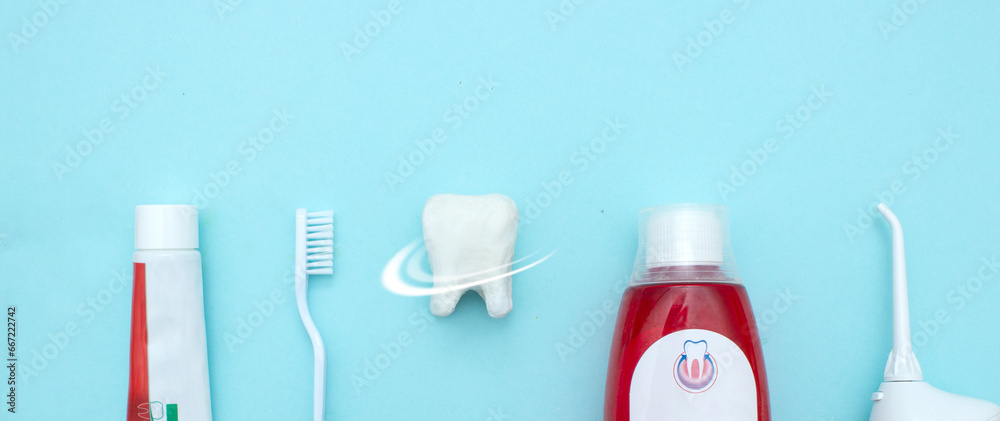 Close up of a toothbrush, toothpaste, irrigator, mouthwash for teeth ...