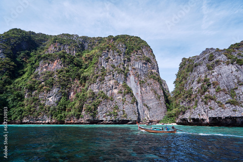 Vacation in Thailand. Beautiful landscape with sea, boat and rocks.