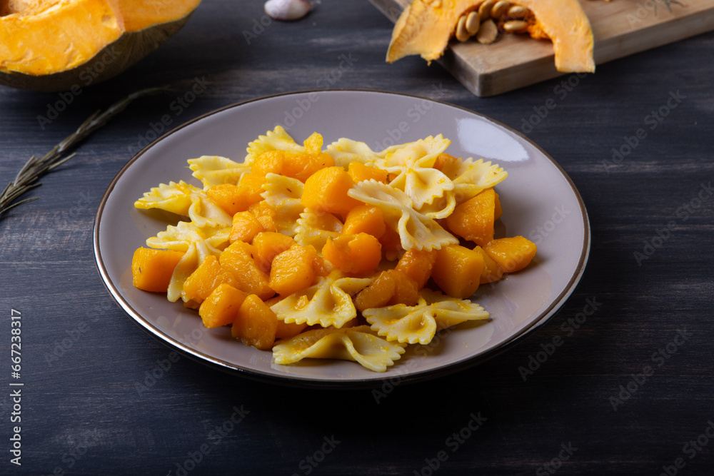 Pasta with pumpkin. Vegetarian autumn dish. Pasta with pumpkin. Vegetarian autumn dish.