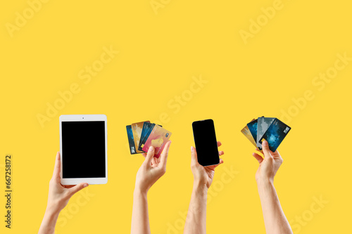 Women with gadgets and cred...
