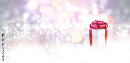 New Year 3d gift box and red bow over silver background with glisters and defocused lights. photo