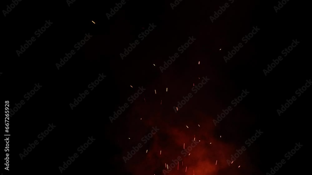 Flight of flames from a bonfire. Fire sparks on a black background can be used as an overlay for transitions. A natural spark. Combustible particles in the air. For use in various projects Flight of flames from a bonfire. Fire sparks on a black background can be used as an overlay for transitions. A natural spark. Combustible particles in the air. For use in various projects