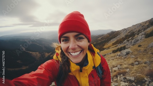 A young woman taking a selfie in the mountains. Generative AI.
