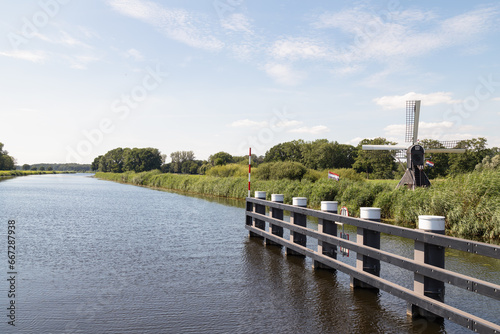 Mill - Keppelse molen, along the Oude IJssel near the town of Laag-Keppel in the Achterhoek. photo