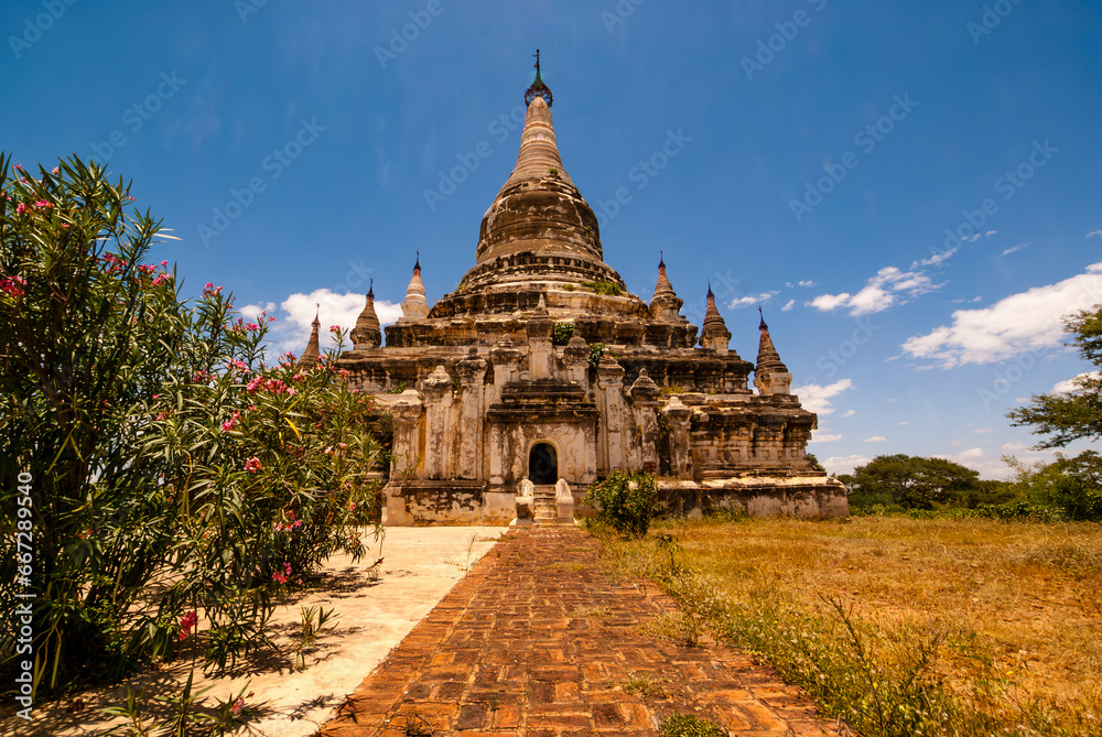 Exterior of a white pagoda in Bagan, Myanmar, Asia