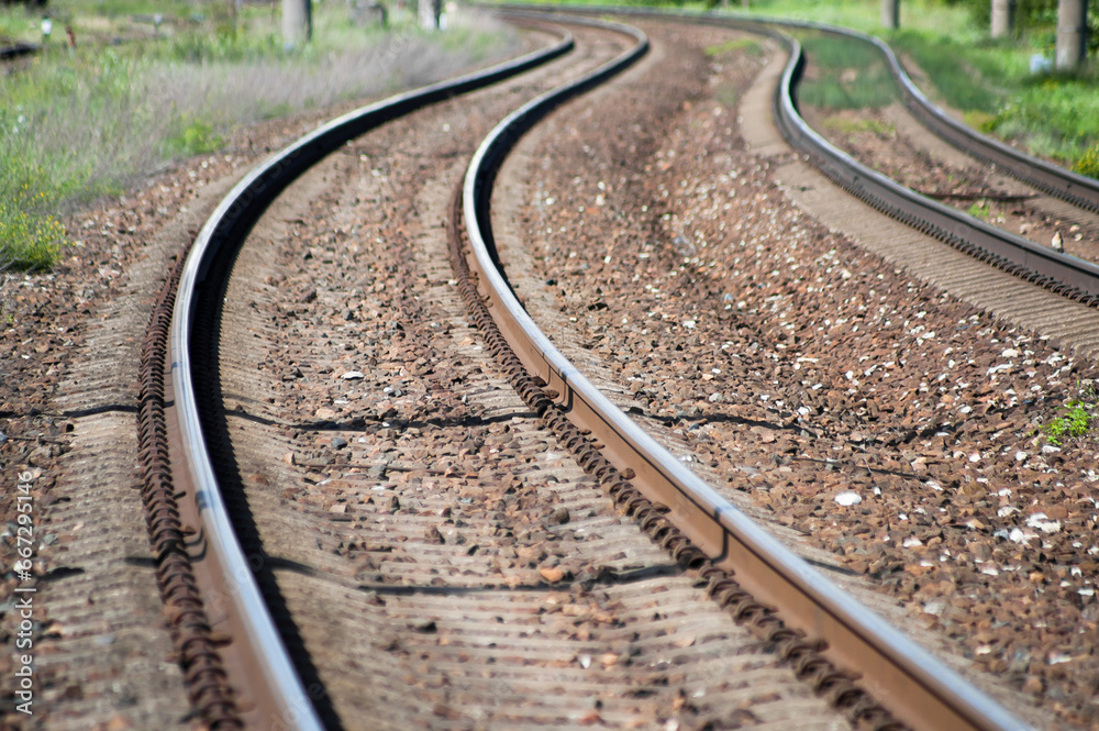 railway close-up, the photo shows winding tracks going into the distance railway close-up, the photo shows winding tracks going into the distance