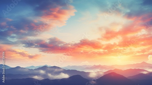 Autumn sunrise cloudy sky over mountains. Abstract colorful peaceful sky background  © Ahtesham