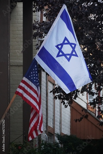 american and isreal flags on the same pole