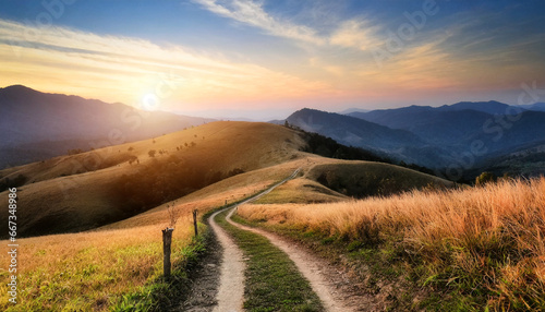 mountain autumn landscape grassy road to the mountains hills during sunset nature background