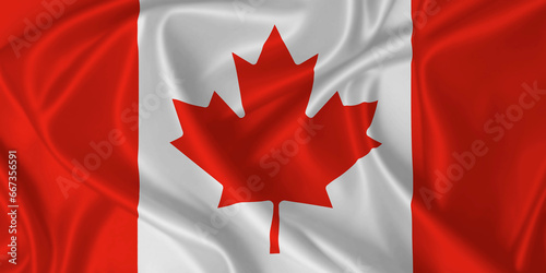 Flag of Canada on fabric texture waving in the wind