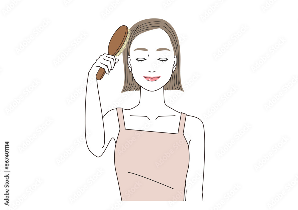 ヘアブラシで髪の毛をブラッシングしながら目を閉じている女性 ヘアブラシで髪の毛をブラッシングしながら目を閉じている女性