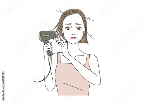 ドライヤーをかけると静電気で髪の毛がボサボサになって困った表情の女性