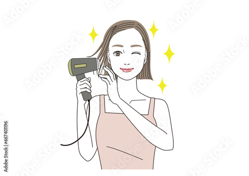 ドライヤーで髪の毛がツヤツヤになって笑顔の女性