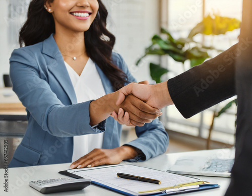 Estate broker agent and customer shaking hands after signing contract documents for realty purchase mortgage loan approval