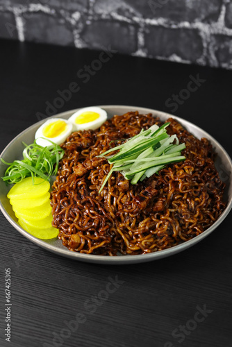 Jajangmyeon Instant Noodle With Black Bean Sauce  Cucumber Slices  Pickled Radish  Boiled Egg  Green Onions