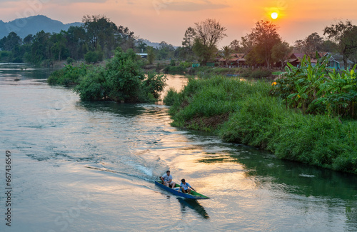 Fotografie Sunset view from Don Det-Don Khon historic railway bridge,crossing the Mekong river the 4000 Islands,Champasak Province of southern Laos