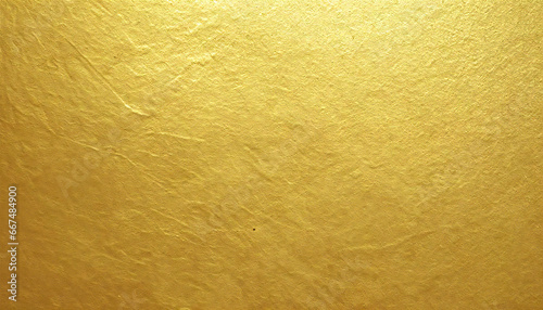 高級感のある金色の背景素材。質感のある金のグラデーションの背景素材。A luxurious golden background material. Textured gold gradient background material.