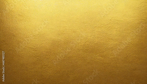高級感のある金色の背景素材。質感のある金のグラデーションの背景素材。A luxurious golden background material. Textured gold gradient background material. photo