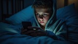 Child is addicted to a phone Sleepy exhausted lying in bed using a smartphone, Insomnia, and addicted. Sad bored in bed scrolling through social networks at night in the dark