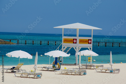 beach umbrellas and chairs on the beach