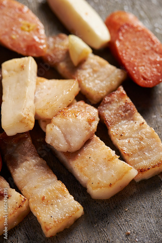 Pork belly grilled in an iron pan