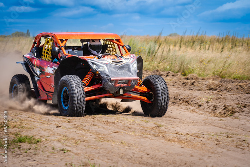 UTV buggy offroad vehicle racing on sand. Extreme, adrenalin. 4x4.