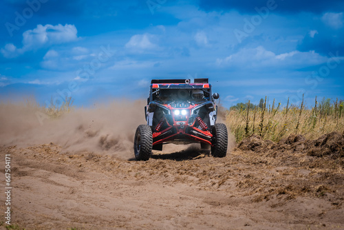 UTV buggy and 4x4 offroad in sandy track. Rally extreme riding © Anton Tolmachov