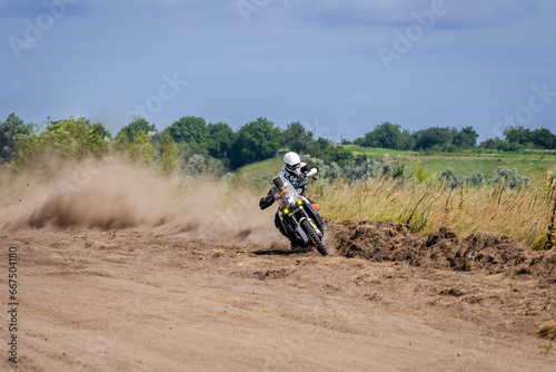 Fototapeta Naklejka Na Ścianę i Meble -  Extreme Motocross track. Riding on dust track