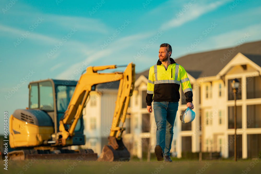 Builder man at building site. Construction manager in helmet. Male construction engineer. Architect at a construction site. Handyman builder in hardhat. Building concept. Builder foreman. Builder man at building site. Construction manager in helmet. Male construction engineer. Architect at a construction site. Handyman builder in hardhat. Building concept. Builder foreman.