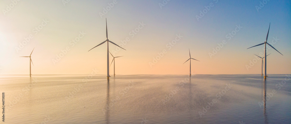 Windmill park in the ocean, drone aerial view of windmill turbines generating green energy electric - obrazy, fototapety, plakaty 