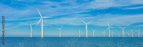 Wallpaper Mural Drone view at windmill turbines, Windmill park with clouds and a blue sky, windmill park in the ocean aerial view with wind turbine Flevoland Netherlands Torontodigital.ca